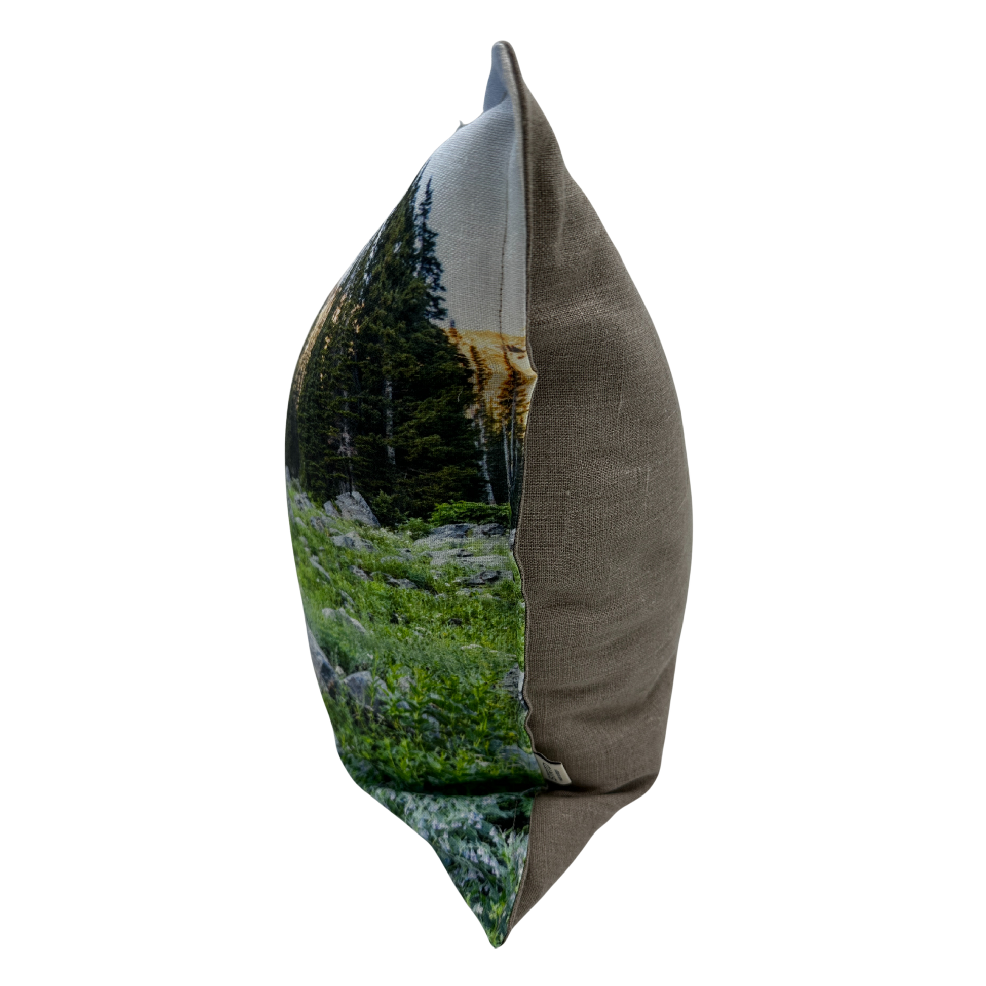 Alta Bloom linen pillow — side view showing soft floral tones inspired by Utah’s alpine blooms.