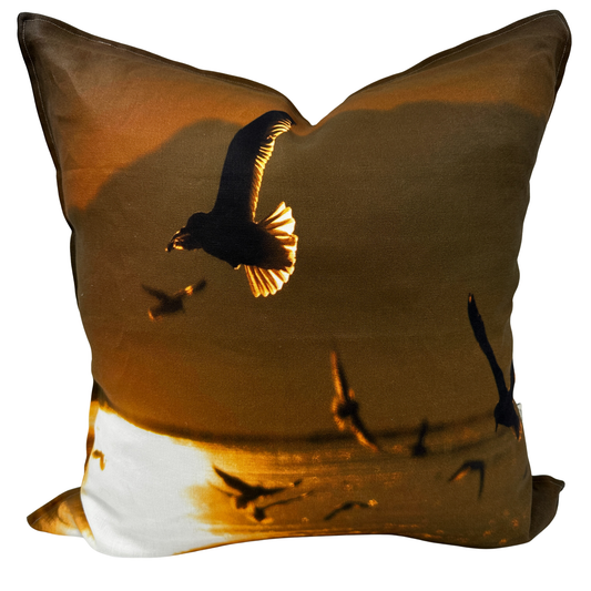 Gull Flight pillow — golden Utah sunset with seagulls in motion printed on natural linen