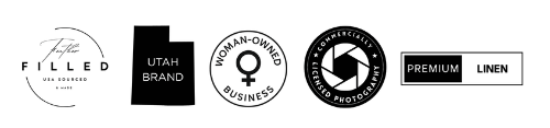 Brand feature badges for STRTD, including premium linen, feather-filled inners, Utah brand, woman-owned business, and commercially licensed photography